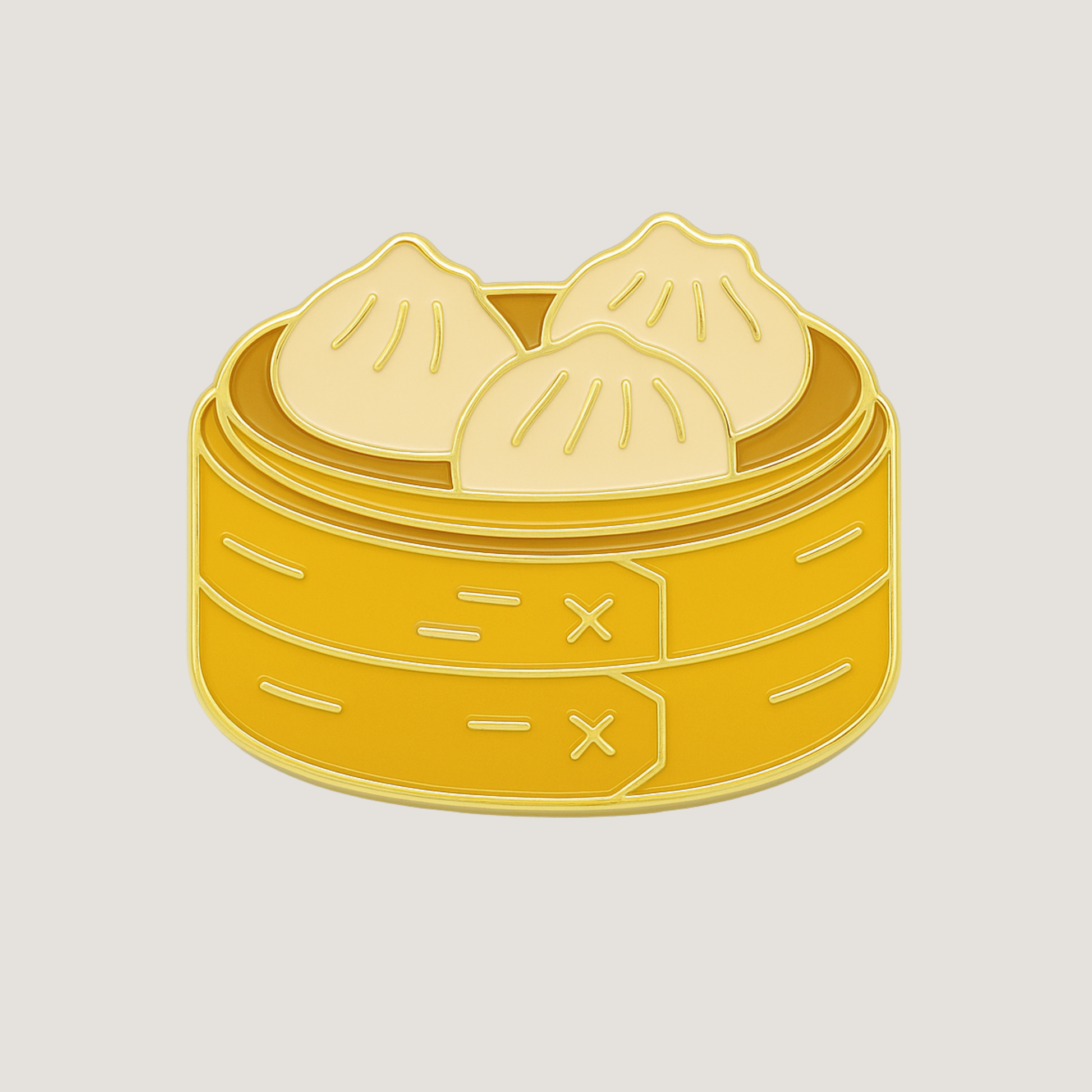 A golf ball marker shaped as a bamboo steamer with three dumplings inside, with shiny gold raised outlines - CHIP PUTTY